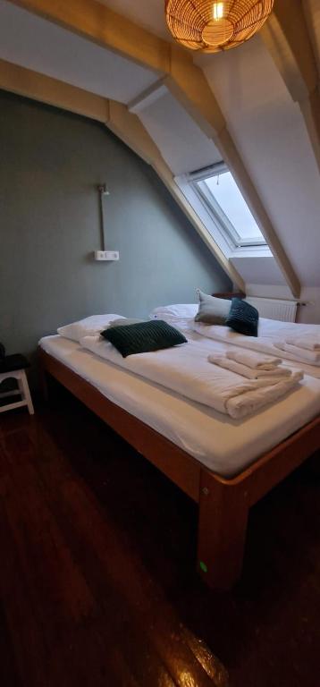 Postel nebo postele na pokoji v ubytování 't Lytse Knipke