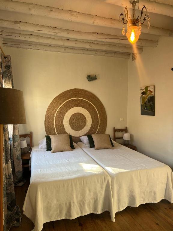 Postel nebo postele na pokoji v ubytování Casa Rural La Chocolateria