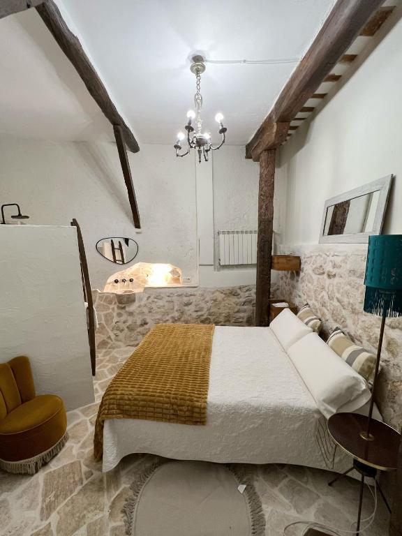 Postel nebo postele na pokoji v ubytování Casa Rural La Chocolateria