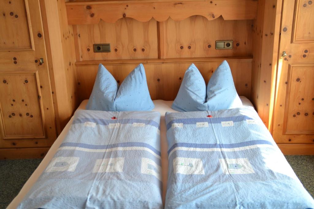 Postel nebo postele na pokoji v ubytování Gästehaus Christoph