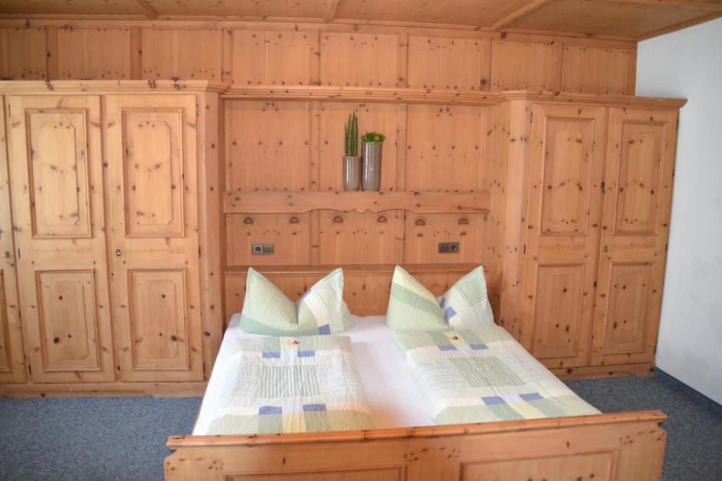 Postel nebo postele na pokoji v ubytování Gästehaus Christoph