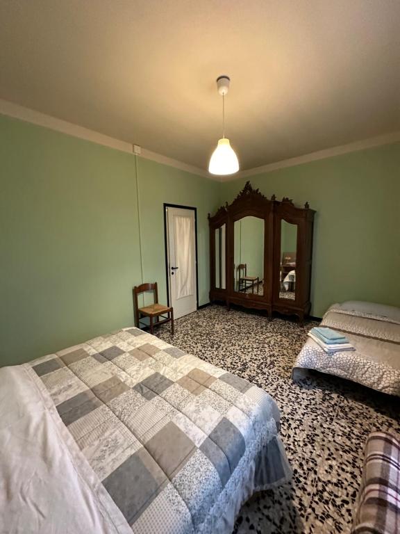 Postel nebo postele na pokoji v ubytování B&B Orchidea Bianca