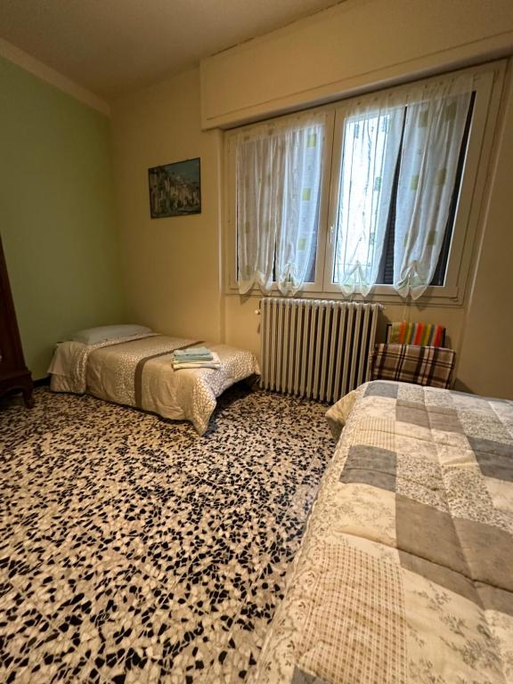Postel nebo postele na pokoji v ubytování B&B Orchidea Bianca