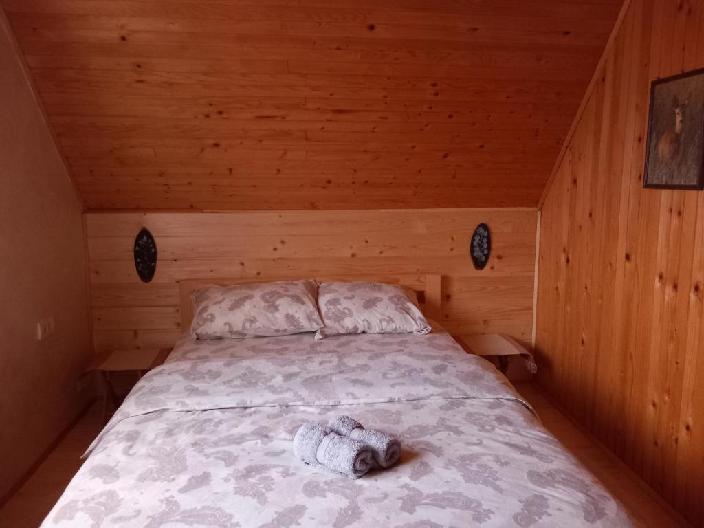 Postel nebo postele na pokoji v ubytování Brvnare Na Brdu