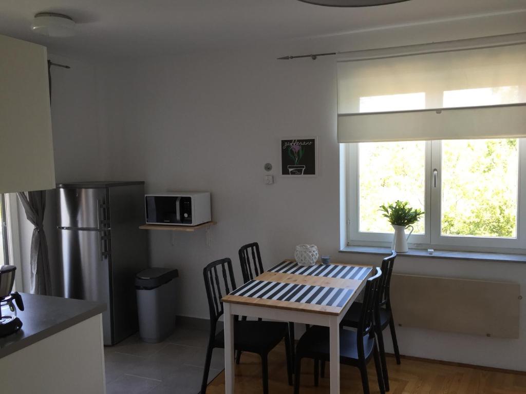 Kuchyň nebo kuchyňský kout v ubytování Apartments Papalinna By Moro