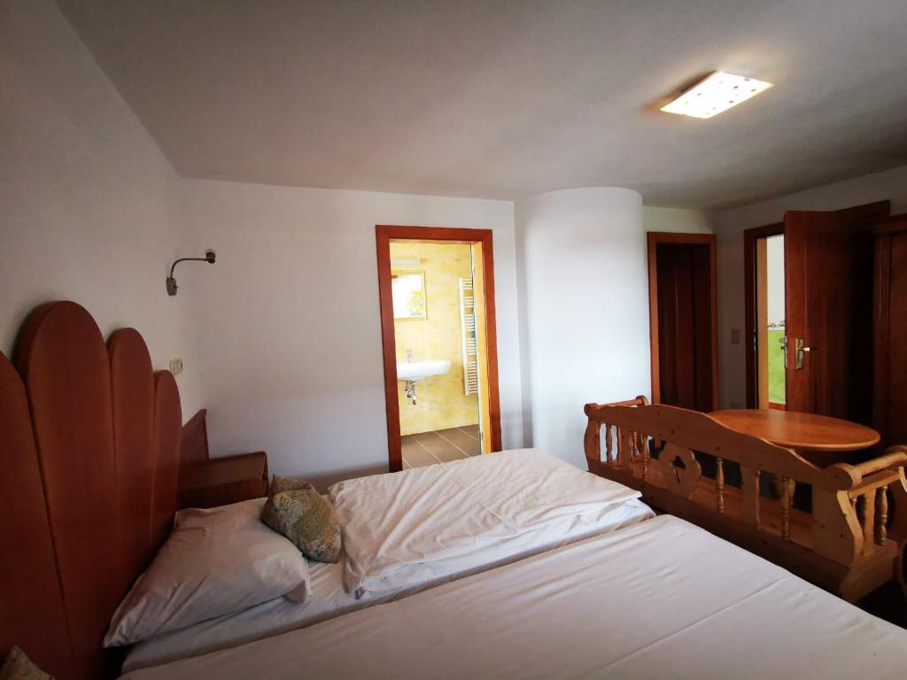 Ein Bett oder Betten in einem Zimmer der Unterkunft Frühstückspension Wahl