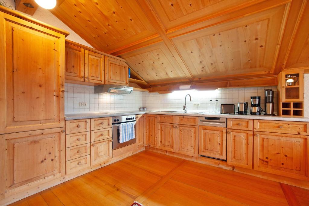 Kuchyň nebo kuchyňský kout v ubytování Ferienwohnung Caprano