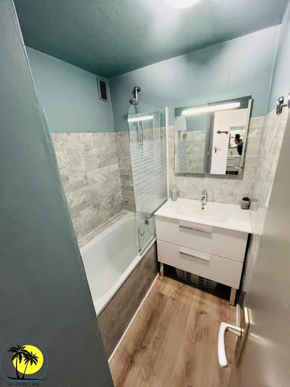 Kúpeľňa v ubytovaní T4 Le Trente Cinq 3 chambres & climatisation