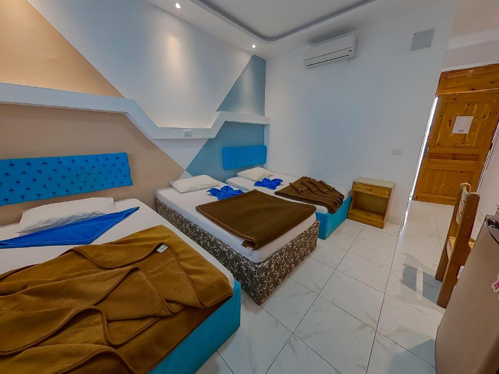 Postel nebo postele na pokoji v ubytování Seaview Hotel Dahab