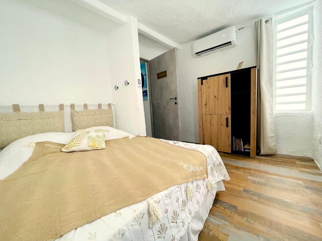 Postel nebo postele na pokoji v ubytování La Kaz Caleepso