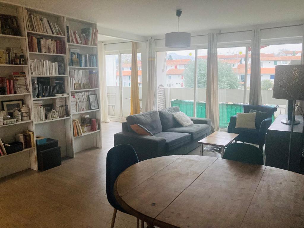 Posezení v ubytování Appartement lumineux 2 chambres