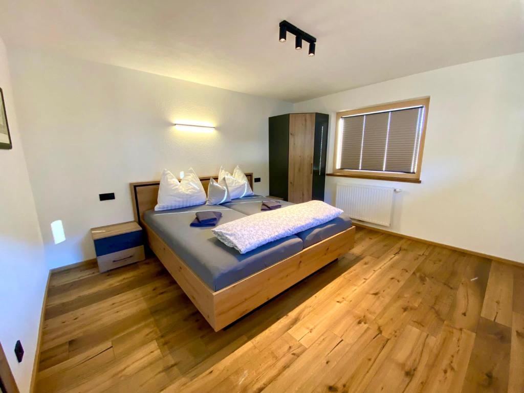 Postel nebo postele na pokoji v ubytování Appartement Hirner