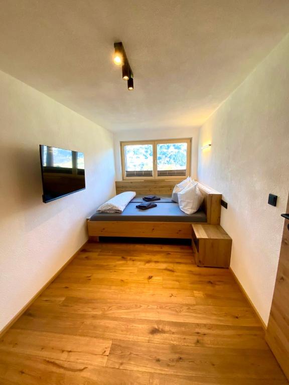 Postel nebo postele na pokoji v ubytování Appartement Hirner