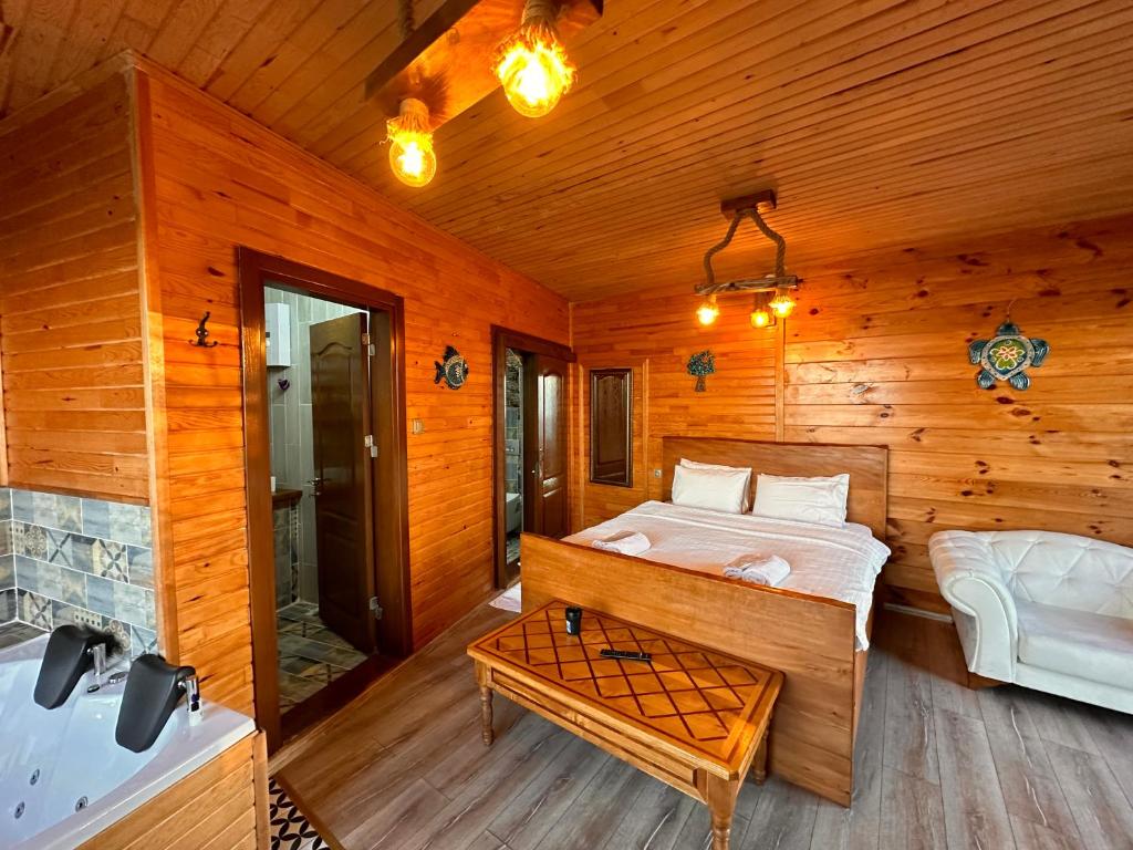 Postel nebo postele na pokoji v ubytování Falez Cafe&Restaurant&Pansiyon-Arhavi