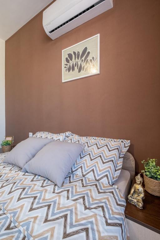 Postel nebo postele na pokoji v ubytování Cozy Homes 1