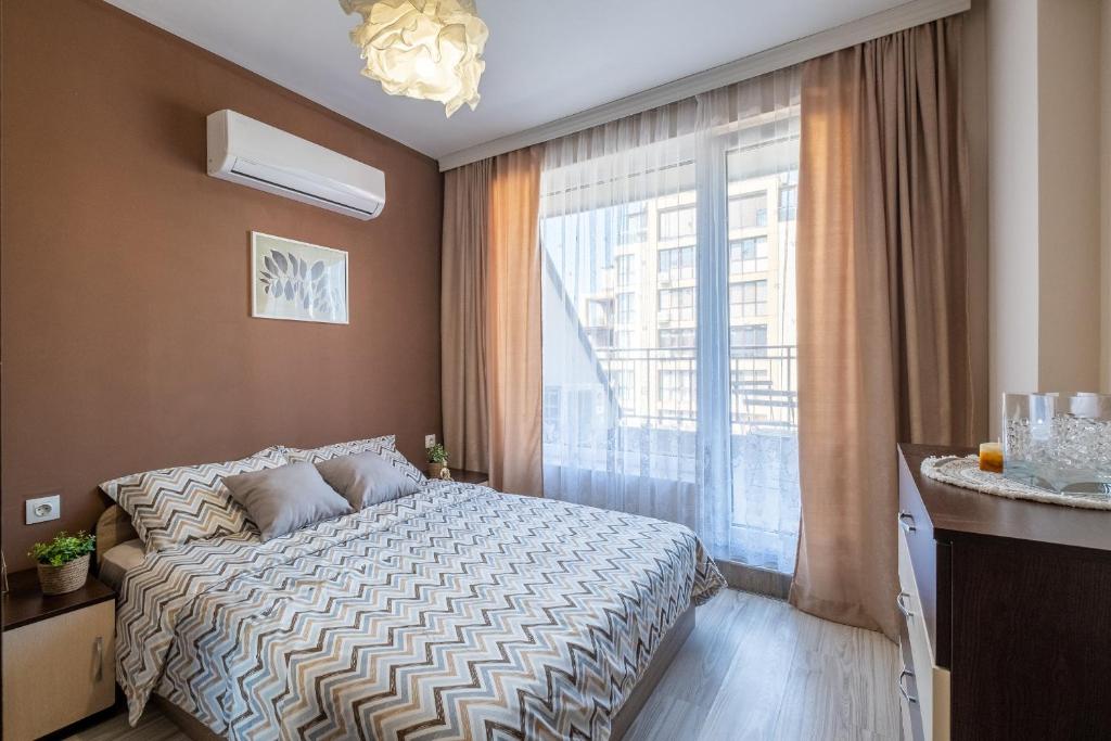 Postel nebo postele na pokoji v ubytování Cozy Homes 1