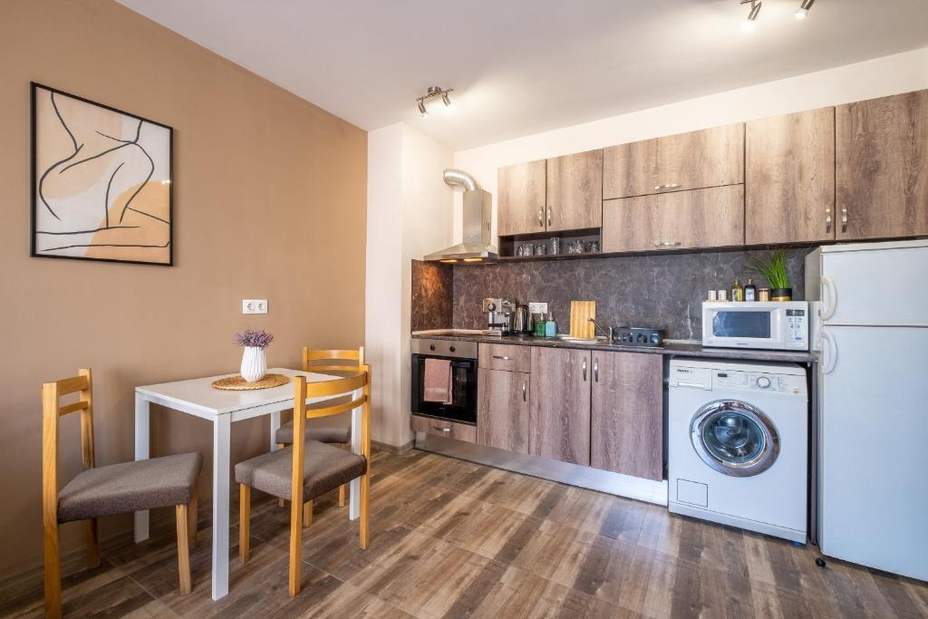 Kuchyň nebo kuchyňský kout v ubytování Cozy Homes 1