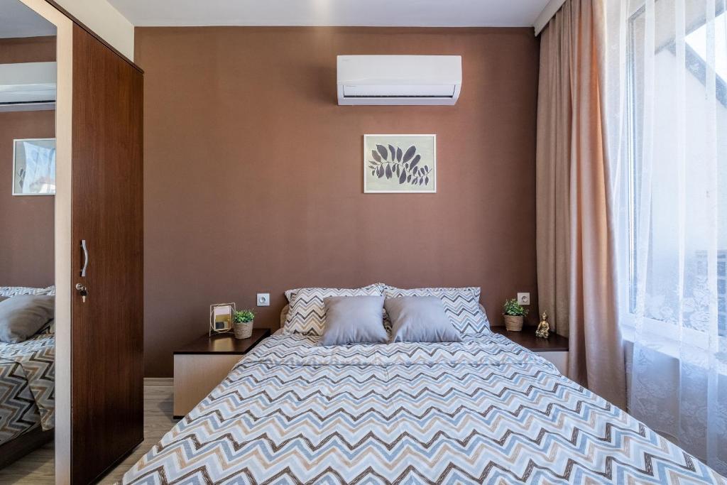 Postel nebo postele na pokoji v ubytování Cozy Homes 1