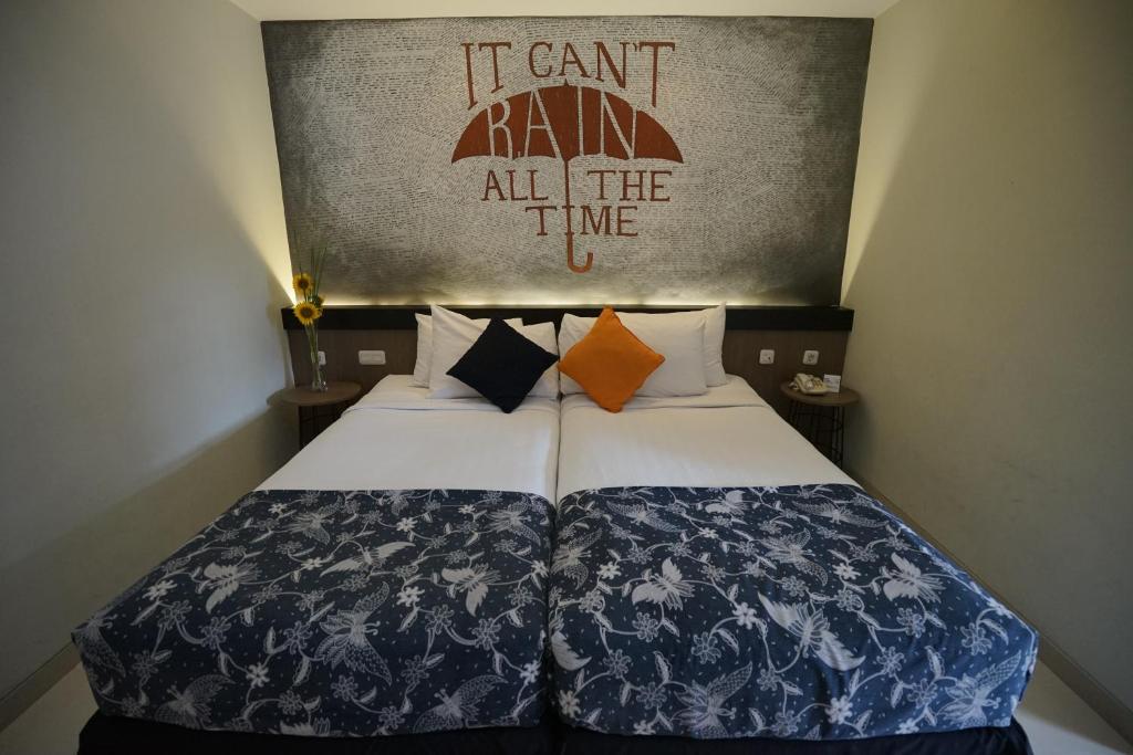 Katil atau katil-katil dalam bilik di Hotel Sriti Magelang