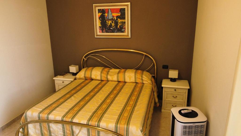 Postel nebo postele na pokoji v ubytování Hotel San Marco