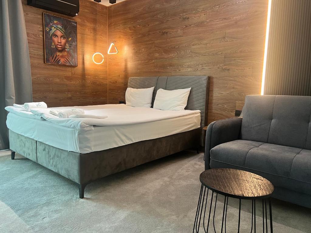 Postel nebo postele na pokoji v ubytování Perun Hotel Sandanski