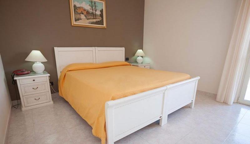 Postel nebo postele na pokoji v ubytování Hotel San Marco
