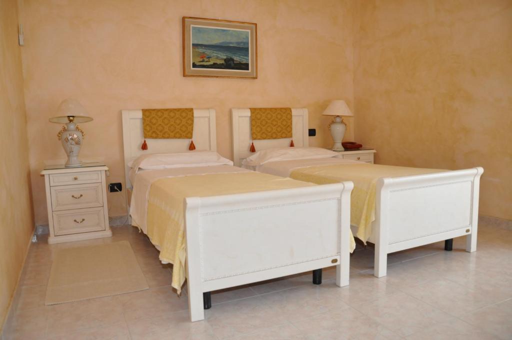 Postel nebo postele na pokoji v ubytování Hotel San Marco