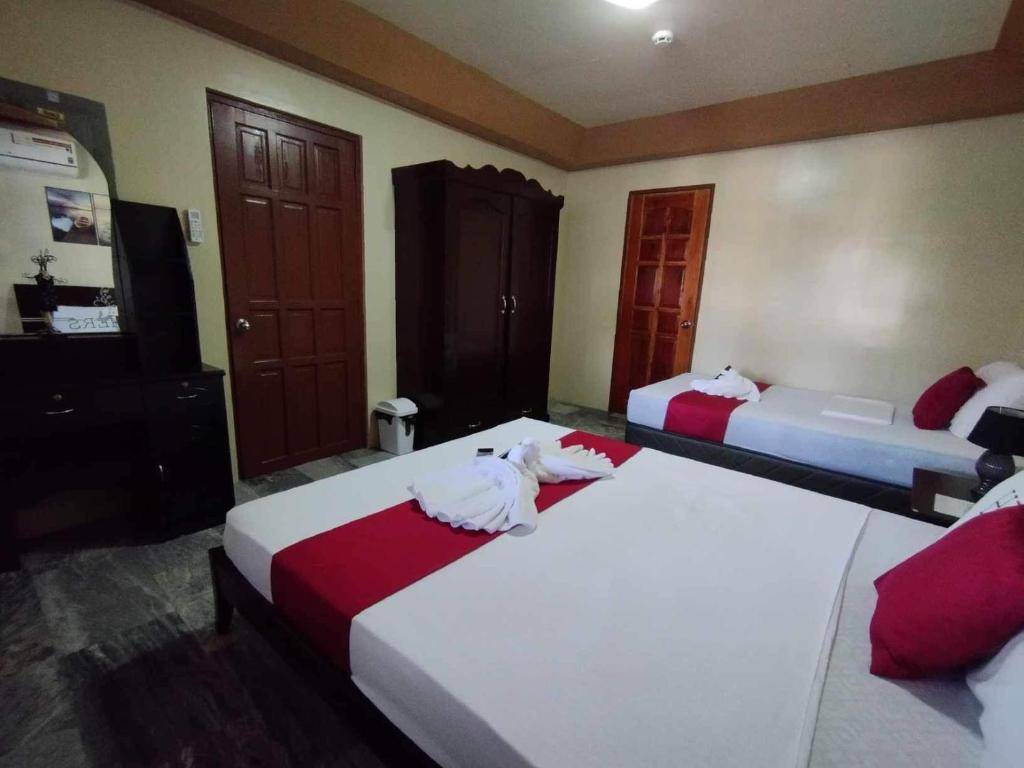 Postel nebo postele na pokoji v ubytování Dreamcatcher Hostel
