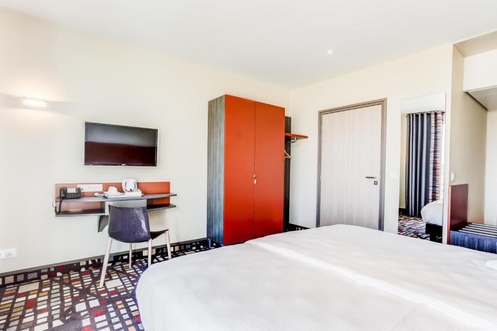 TV a/nebo společenská místnost v ubytování Hotel ParKest