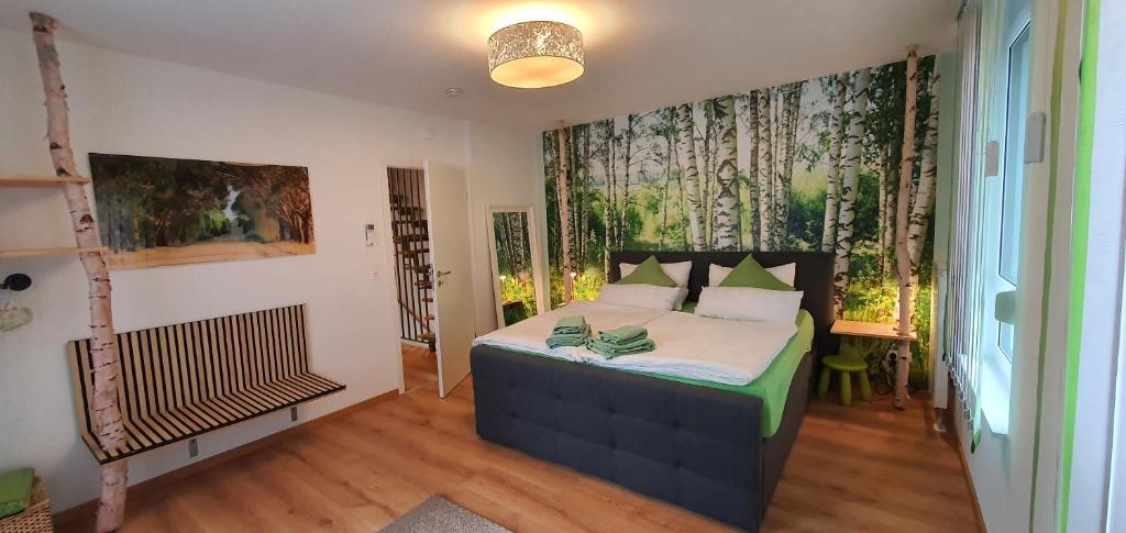 a bedroom with a bed with pillows on it at Ein Haus zum Träumen in Bensheim
