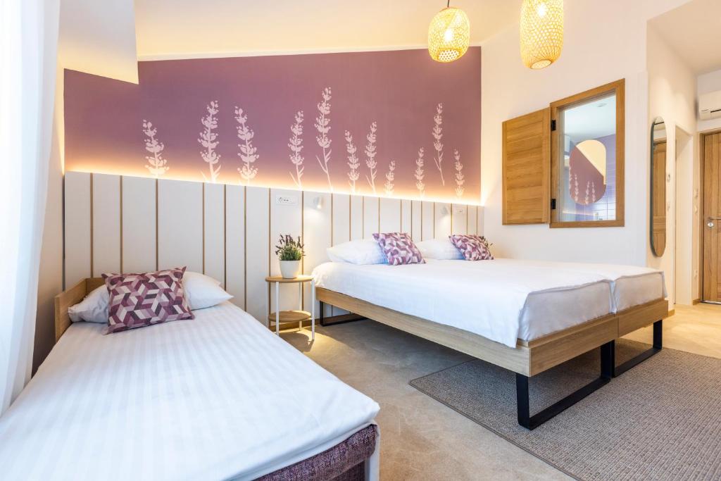 Postel nebo postele na pokoji v ubytování Hotel Vile Park Premium