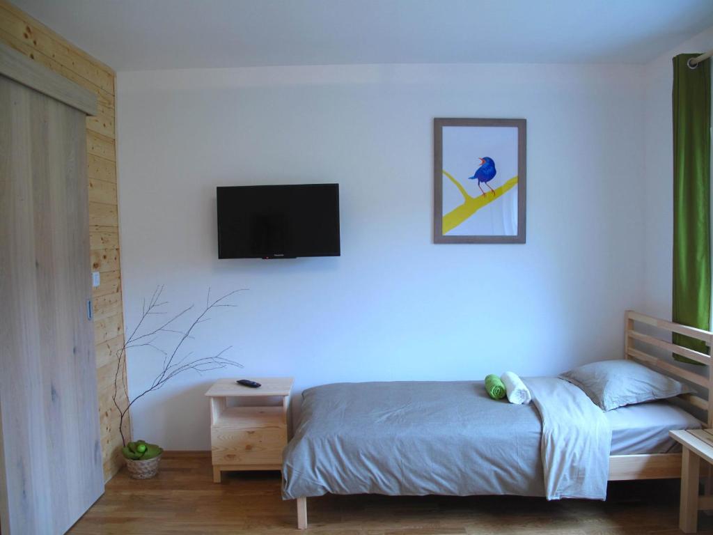 Posteľ alebo postele v izbe v ubytovaní Guesthouse Bor Plitvice Lakes