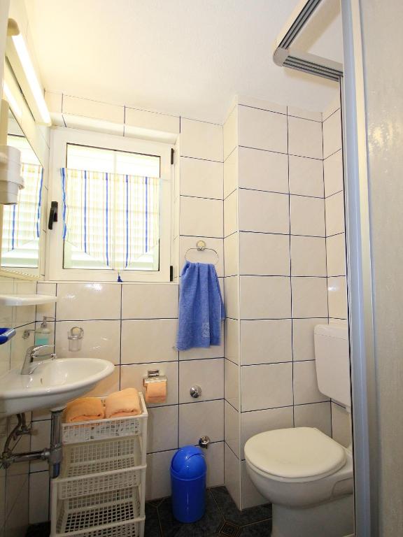 Koupelna v ubytování Apartment Vucic