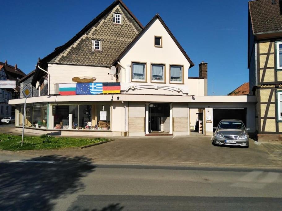 a car parked in front of a building at Wellcome in Evita House in Dassel