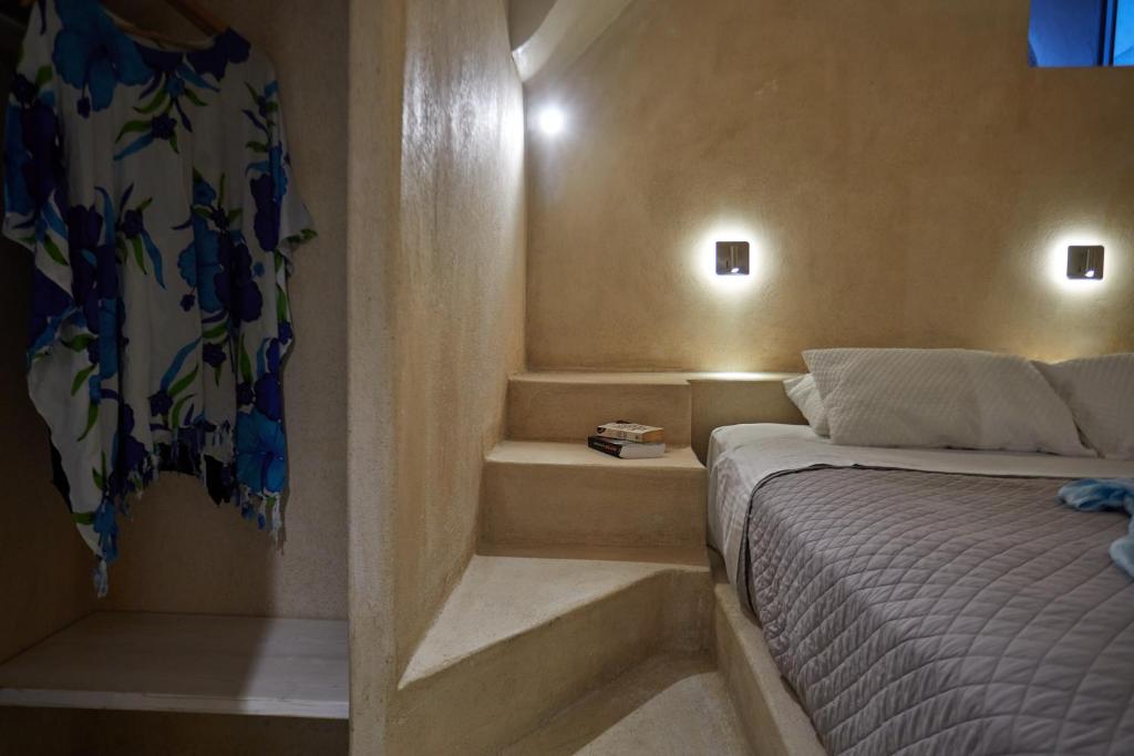 Postel nebo postele na pokoji v ubytování Oia's Cellars