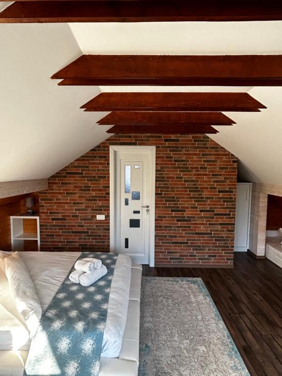 Postel nebo postele na pokoji v ubytování Doftana Apartaments