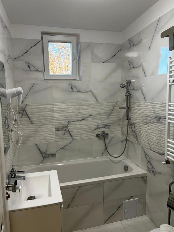Koupelna v ubytování Doftana Apartaments