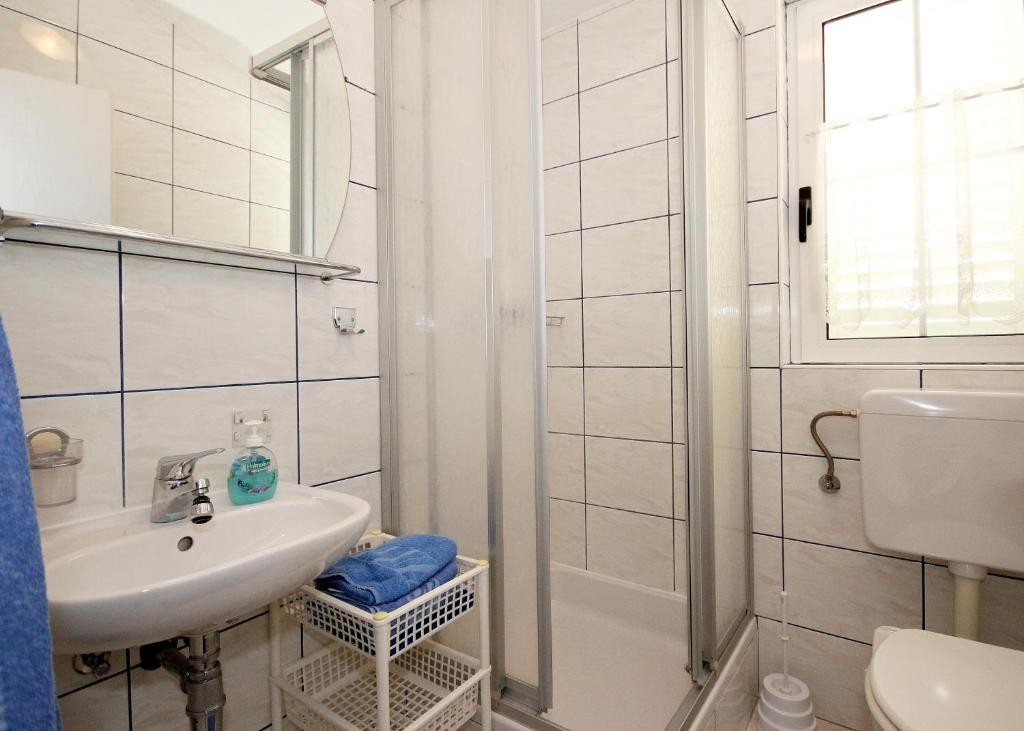 Koupelna v ubytování Apartment Vucic