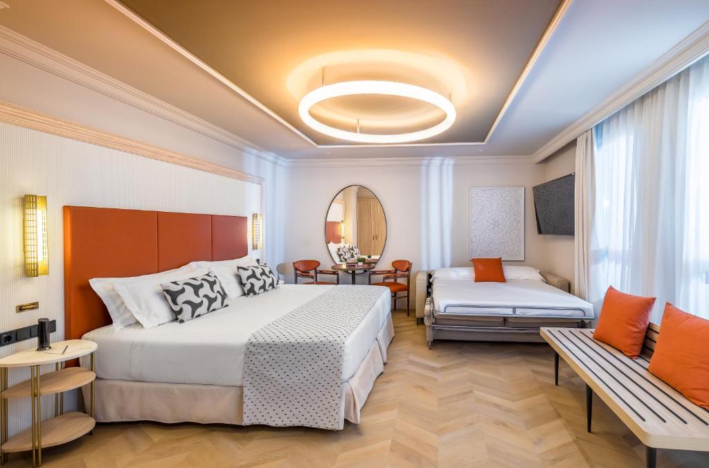 Postel nebo postele na pokoji v ubytování Barceló Carmen Granada