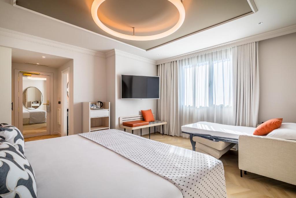 Postel nebo postele na pokoji v ubytování Barceló Carmen Granada