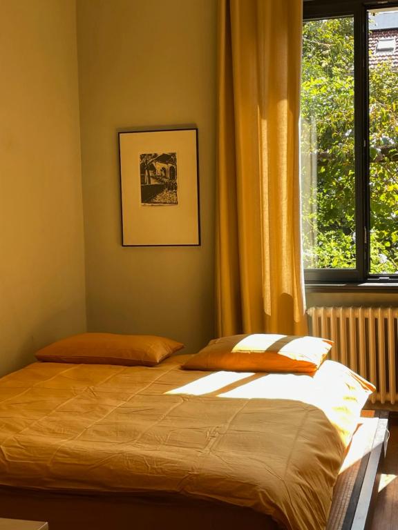 Postel nebo postele na pokoji v ubytování Casa d'epoca con giardino 5 min da Locarno