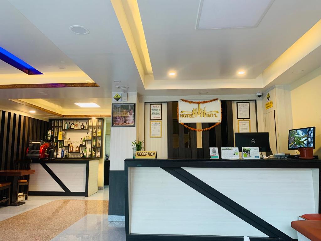TV a/nebo společenská místnost v ubytování Hotel Abi International