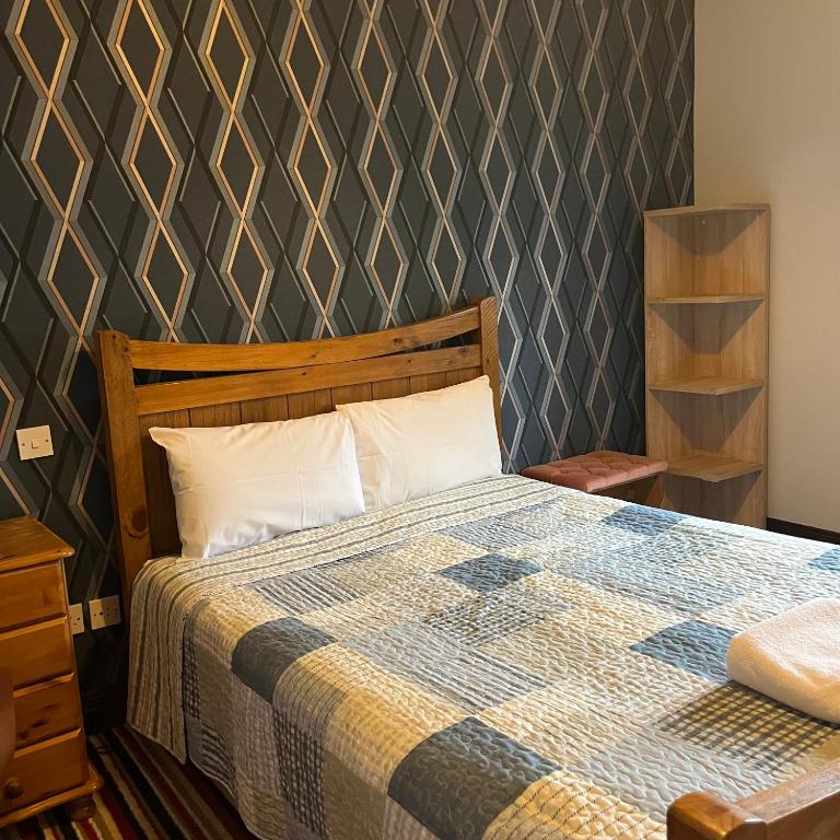 Postel nebo postele na pokoji v ubytování The Yeats County Inn Hotel
