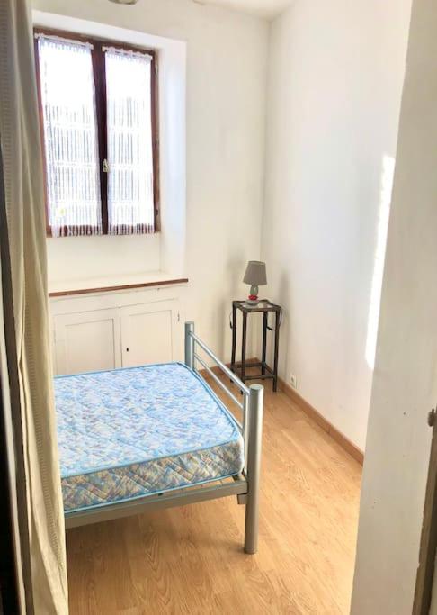 Postel nebo postele na pokoji v ubytování Appartement T3 agréable à Bourbon l'Archambault