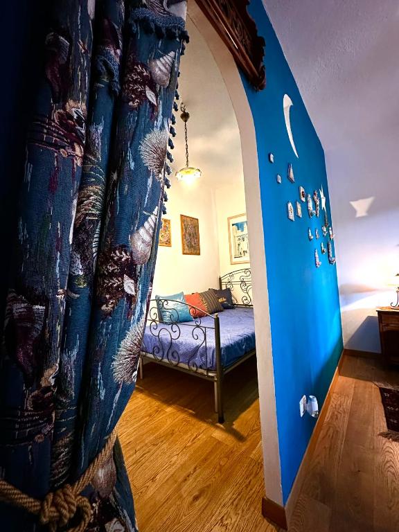 Posteľ alebo postele v izbe v ubytovaní Casa Perciata - Locazione Turistica