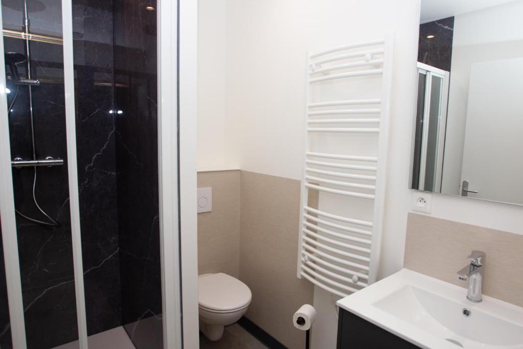 Koupelna v ubytování Appart Hotel Coutances