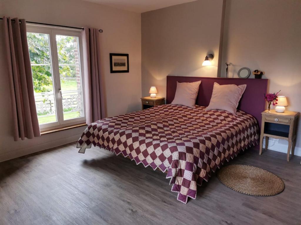Postel nebo postele na pokoji v ubytování Manoir du Taillis