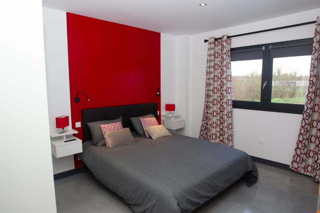 Postel nebo postele na pokoji v ubytování Appart Hotel Coutances