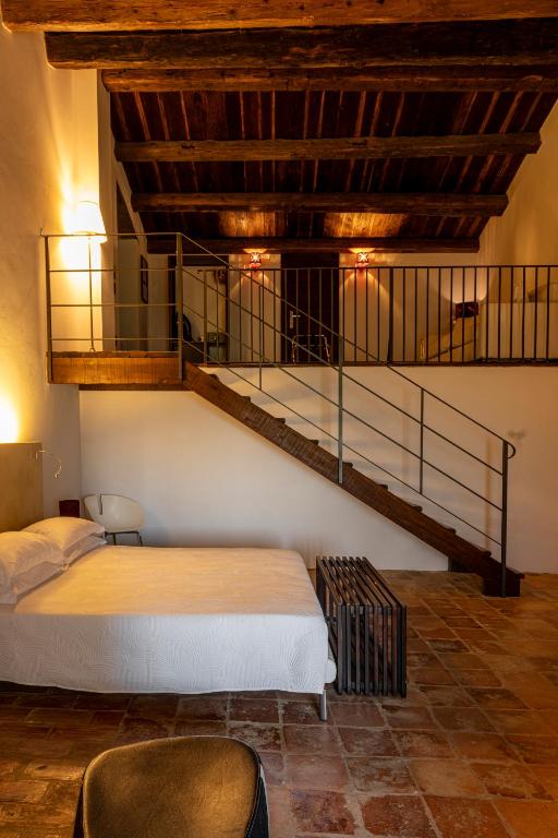 Postel nebo postele na pokoji v ubytování Castello Di Semivicoli
