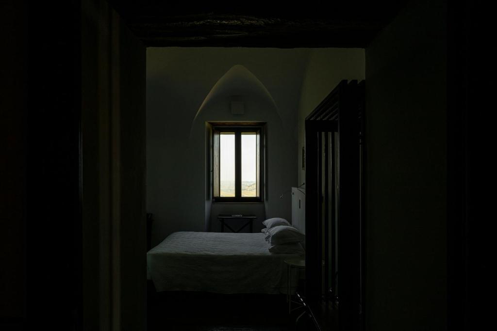 Postel nebo postele na pokoji v ubytování Castello Di Semivicoli